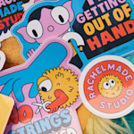 Colorful die-cut sticker singles for a small business for puppets. 