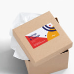 A packaging with a business card sticker on the top promoting a knitting and crochet supplies business.