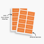 Two overlapping sheets of business card stickers advertising a business consulting business.