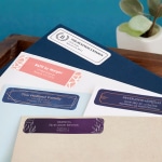 Various letters with return address labels from different companies placed in the upper corners.