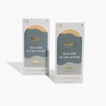 Two gold embossed foil rack cards promoting a sale at a boutique.