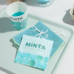 Flat pouch for dental clinic with floss brushes inside.