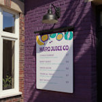 A menu board showing a menu for a juice bar with pricing.