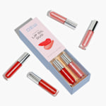 Slide-open box with 2 lipsticks inside. The box has 4 more lipsticks scattered around the box.