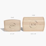 Two custom cutting boards labeled by their size; the small board is 9" x 12" and the large board is 10.5" x 16". 