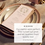 A menu personalized for a wedding with a review: “Our menus were perfect! They turned out great and we received them quickly too!” 