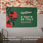 A vinyl banner hanging on a wall promoting an Italian restaurant. Highlighted benefits include new lower prices, easy upload, 25+ sizes and fast, free shipping.
