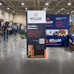 A retractable banner promoting a home renovation business. Highlighted benefits include the pre-assembly, easy upload, 1000s of designs and fast, free shipping. 