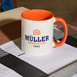 A mug customized for a construction business.  