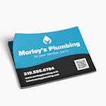A stack of magnetic postcards from a plumbing service, featuring their name, logo & contact details.
