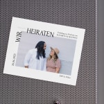 Eine magnetische Save-the-Date-Karte mit dem Foto eines Paares.