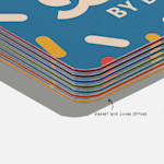 A stack of custom triple layer business cards with three different inlay colours: blue, citrine and bright red.