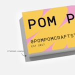 A closeup of a business card with standard corners.