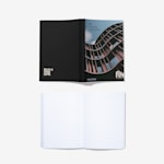 Three perfect bound notebooks side by side: one promoting a wellness boutique, one promoting a financial consultancy, and a personalised journal.