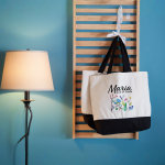 A couple of custom canvas totes personalized for a wedding party.