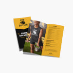 Two bi-fold brochures for a gym, one open and one closed.