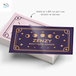 A stack of glossy business cards from a boutique, with a 24-hour delivery icon in the corner, and note that says “Order by 11 AM for next-day delivery in Ontario.”