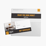 A gift certificate from a café, resting against an open gift certificate holder.