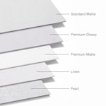 A selection of paper stocks labeled with their materials: standard matte, premium glossy, premium matte, linen and pearl. 