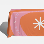 edge of a rectangle tablecloth with company logo