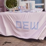 custom rectangle tablecloth for a beauty brand at an event