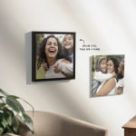 Two photo canvas prints personalised with family photos, with a note that says you can upload a pic, then add a frame.