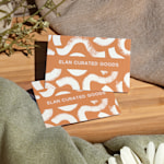 Cotton business cards for a curated goods business.