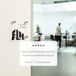 square acrylic sign with logo on a wooden door in an office