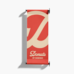 A wall-mounted banner promoting a doughnut business.