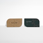 Kraft leaf shaped business cards promoting a kombucha business, with 2-sided printing.