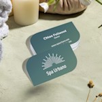 Leaf shaped business cards promoting a spa, with 2-sided printing.