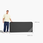 A person standing next to an event barrier, which measures 2000 x 900 mm.