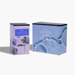 Two tradeshow display counters promoting a cosmetics brand, side by side. One is square, while the other is rectangular.