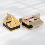 2 yellow and black custom gable boxes. 1 box has jarred honey inside.