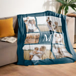 A custom blanket featuring a monogram and collage of family photos.