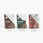 An image of a variety of coffees in stand-up pouches, featuring white, clear and metallized materials.