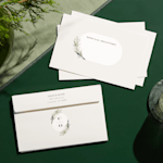 A custom envelope with a bold and colorful design showing a return address on the back.