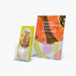 Marketing materials for a beauty and wellness brand inside brochure and flyer holders.