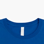 The collar of a blue crewneck T-shirt.