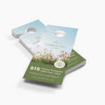A stack of door hangers promoting an offer at a florist shop.
