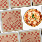 A variety of different branded pizza boxes top side up.