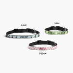 Three personalized dog collars, printed with different names: Stewart, Scout and Rosie, with a note for their respective sizes: Large, Medium and Small.