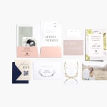 A spread of various wedding cards in different styles, including an invitation, save the date card, RSVP card and details card.