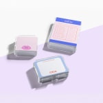 3 different sizes of acrylic Post-it® holders, filled with custom Post-it® Notes for a beauty company.