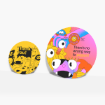 Two different sizes of circle-shaped postcards, custom-printed for a puppet studio.
