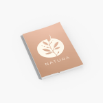 A personalized journal with the business name Natura written on the cover.