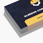 A stack of fine grit business cards for a construction company.