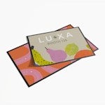 The front and back side of a colorful logo floor mat.