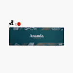 A custom yoga mat printed with a botanical border and the name of a local yoga studio.