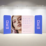 3 tension fabric displays standing side by side promoting a skin care sale.